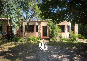 Arguello: Oasis Natural de 1.400 m² con Potencial para 5 Viviendas